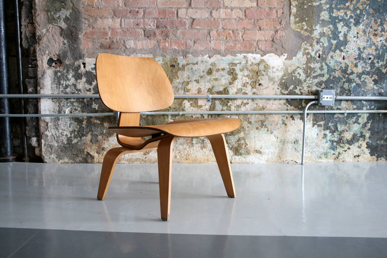 'Lounge Chair Wood' LCW by Charles Eames for Herman Miller,  USA 1950's. This is a beautiful example in original finish with a warm patina.