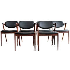 Rare set of eight rosewood  & leather Model 42 dining chairs by Kai Kristiansen