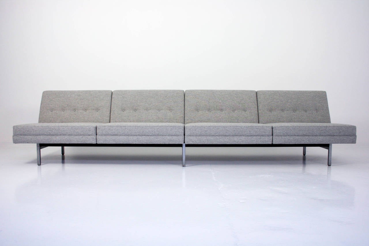 An exceptional example of George Nelson's Modular Group Series sofa. This one has been completely redone in a Maharam Grey Wool.