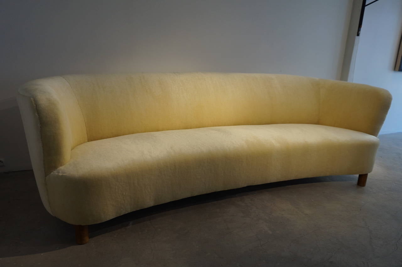 Large curved sofa designed by Mogens Lassen during the 1940's in Denmark.
Newly Reupholstered in a wonderfull Mohair designed by Raf Simons.
Perfect condition