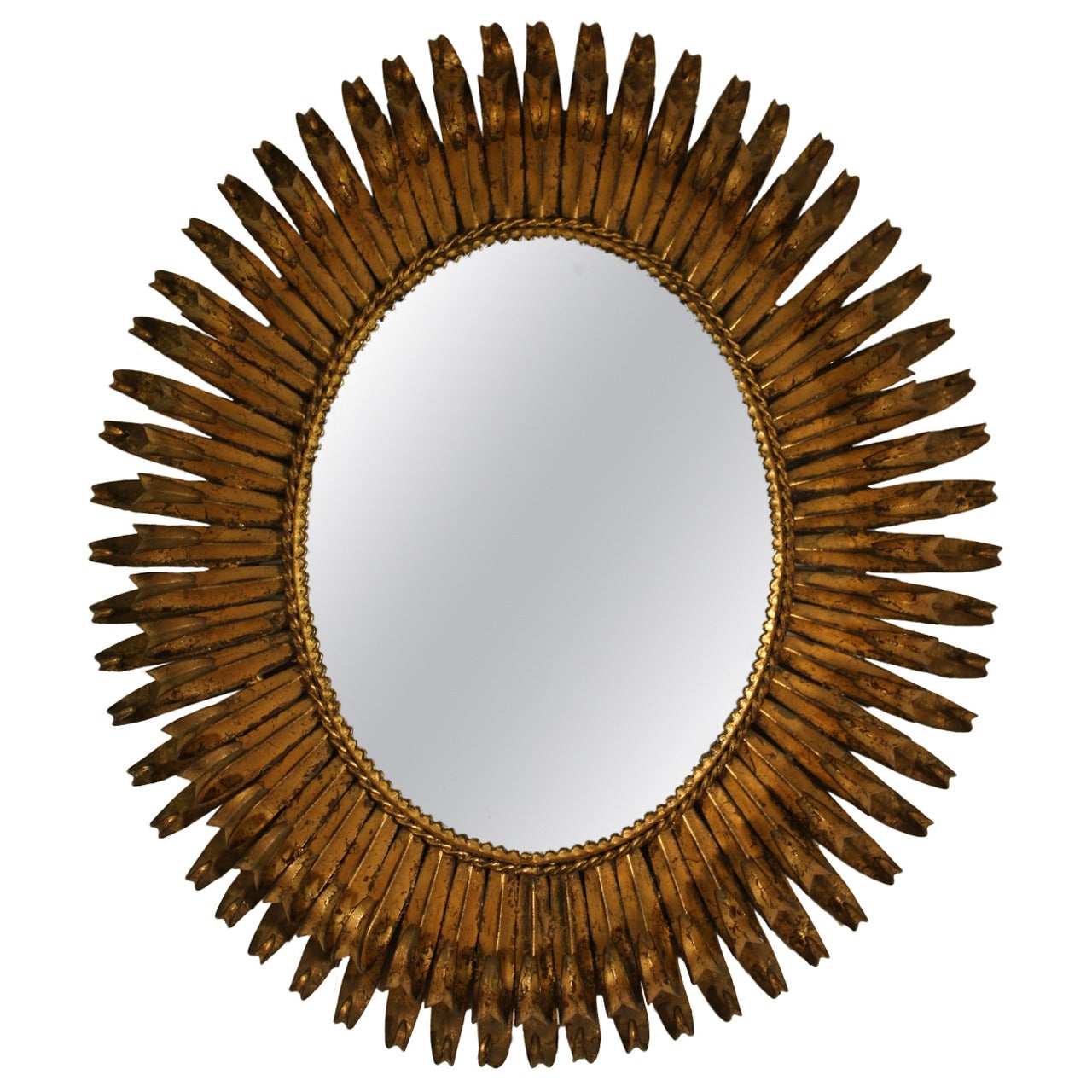 Gorgeus Spanish Brutalist Oval Sunburst Mirror
