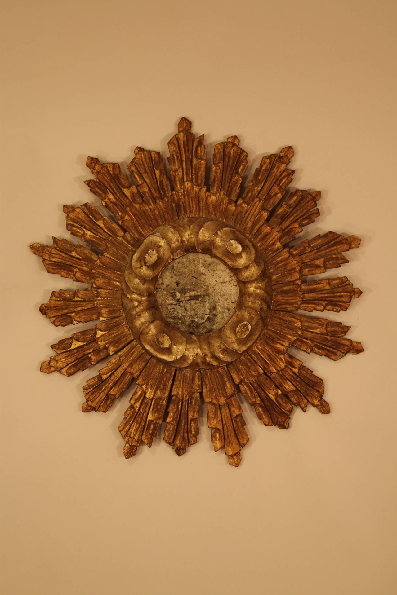 Spanish Baroque giltwood mini sunburst mirror, the interior part is in silver leave wood.