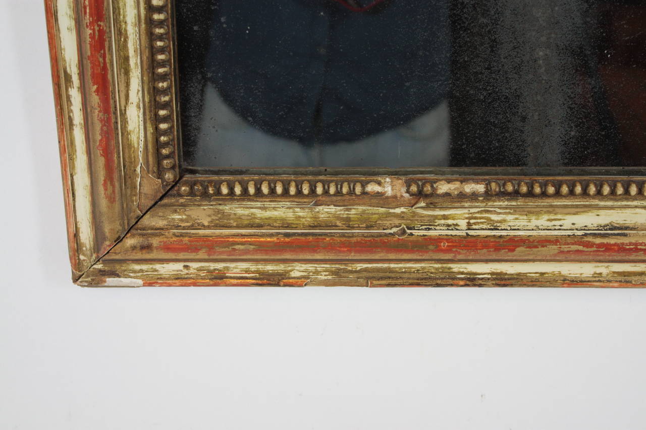 Mid-19th Century French Louis Philippe mirror with red and beige patina