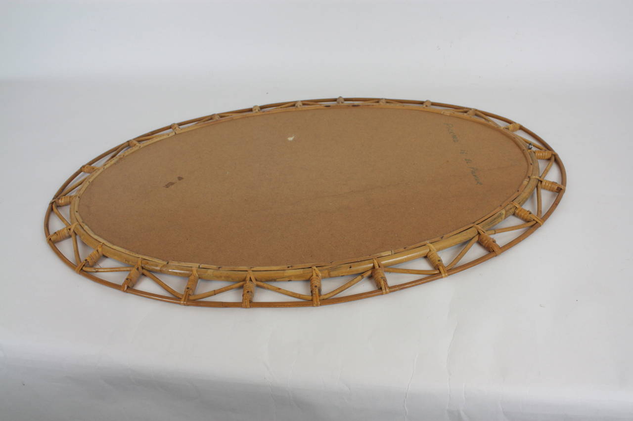 Mid-20th Century Bamboo and Wicker Oval Mirror with Geometric Design from the Coast of Cadiz