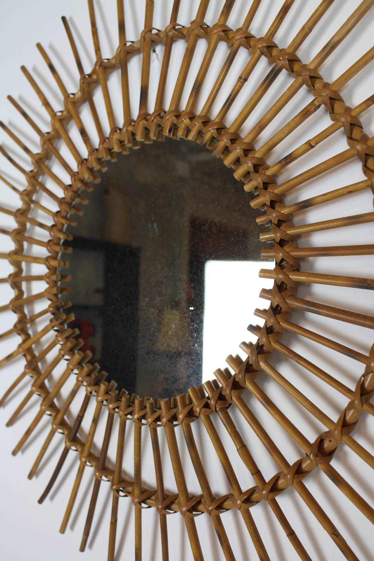Beautiful sunburst mirror made in rattan and bamboo at the 1960s, Mediterranean Coast taste.