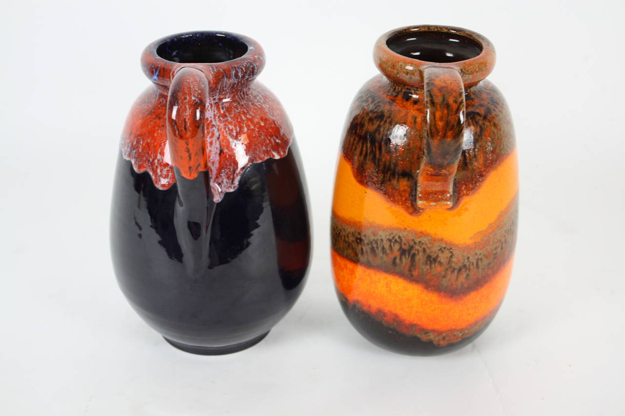 Duo of Fat Lava West Germany Pottery Vases in Vibrant Orange and Dark Colors For Sale at 1stdibs