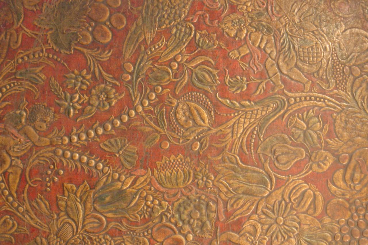 A c 1860 embossed and painted leather wall panel from Mechelen Belgium. Extravagantly embossed leather panels were used as wall coverings in the finest homes from the 17th thru the end of the 19th century Flanders, the Netherlands and