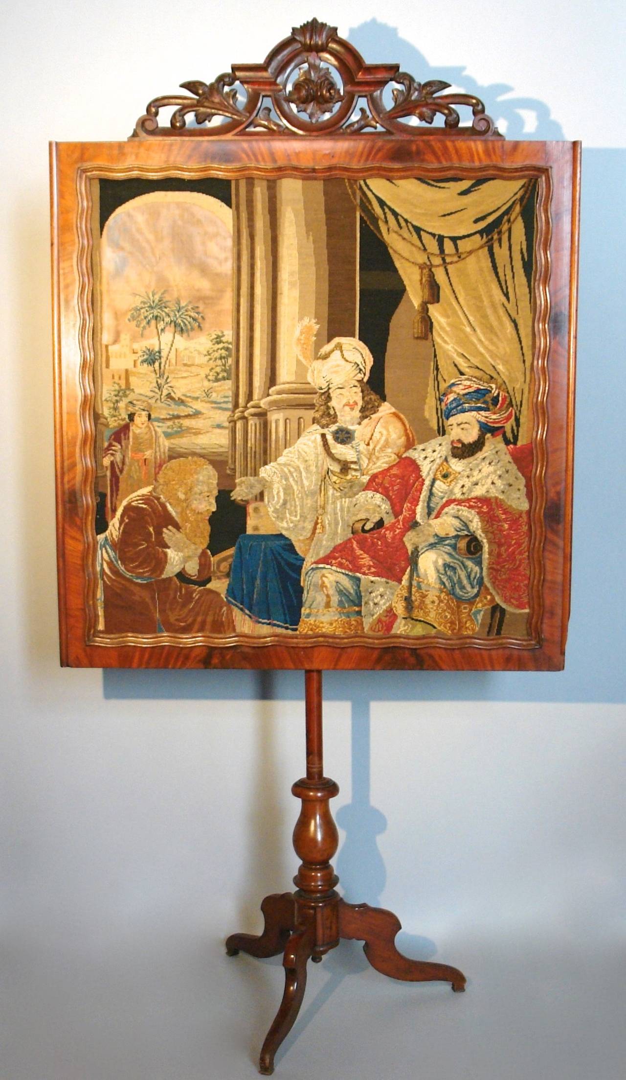 Period Napoleon III Dutch mahogany fire screen retaining the original needlepoint and glass beaded inset.
In the second half of the 19th century symbolism and secret societies were at their height of popularity thru-out America and Europe.
Symbols