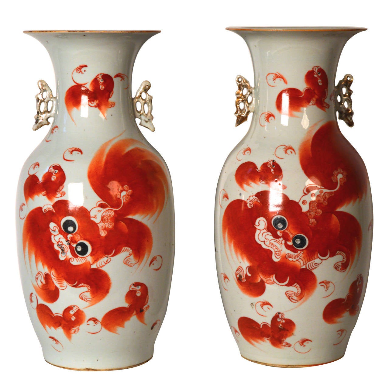 Two 19th c Chinese porcelain Qing vases decorated with orange foo dogs
