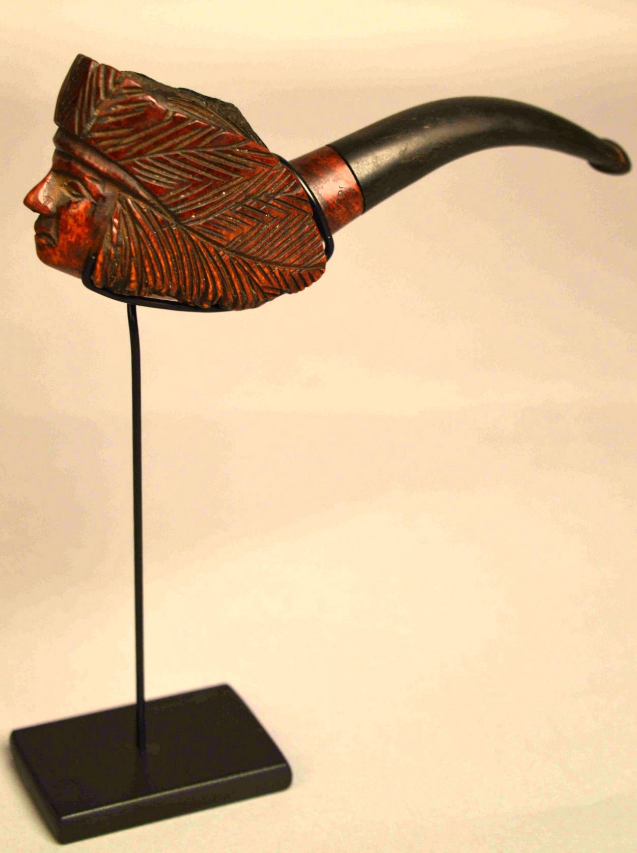 A very unique French sculptural carved wood Native American Indian Chief.
Carved briarwood Indian chief tobacco pipe.
Stamped in French gruyere guarantee; which translates to
guaranteed briar(wood); indicating that it is traditional briarwood