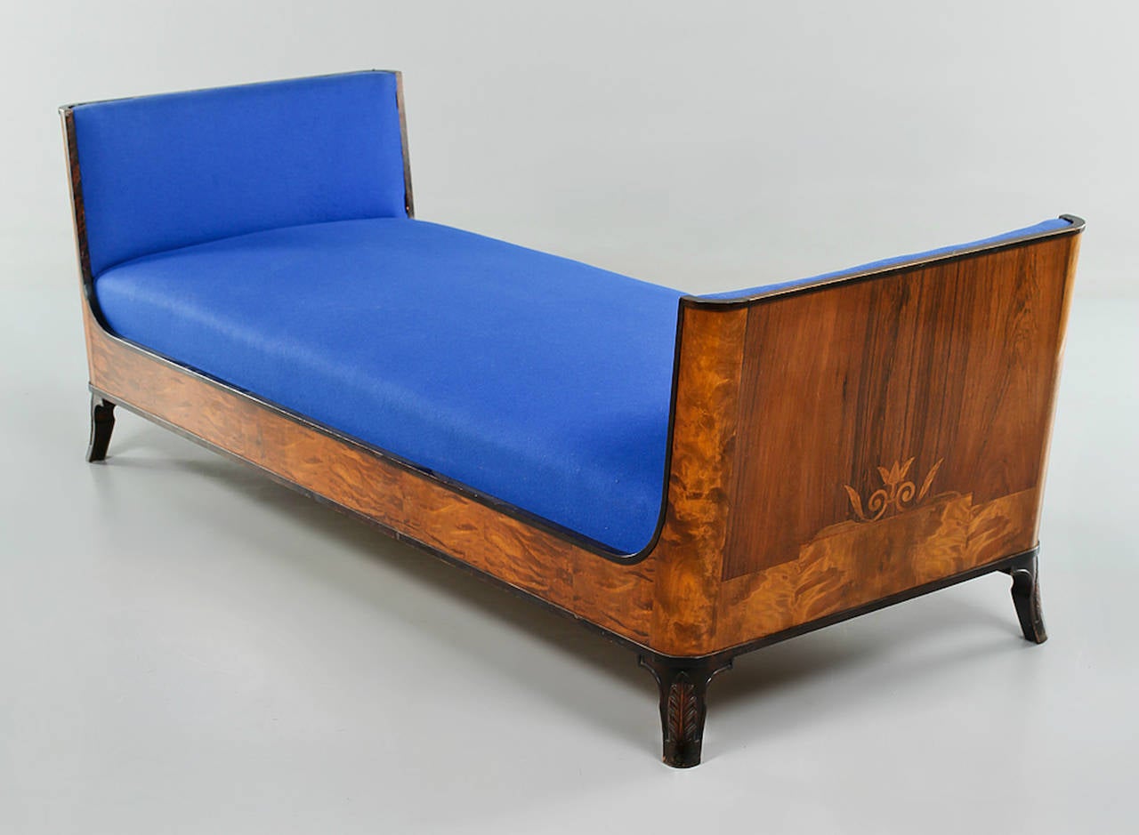 Fantastic Swedish daybed or sofa designed by Erik Chambert and made in the 1930s by the Chambert Mo¨belfabrik in Norrkoping, Sweden.
 Flamed birch and padouk wood with blue wool upholstery.