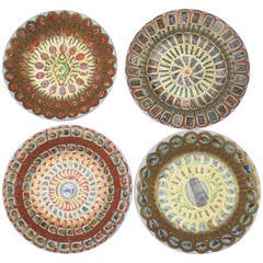 Folk Art Collection of Four Plates Decoupaged with Cigar Bands