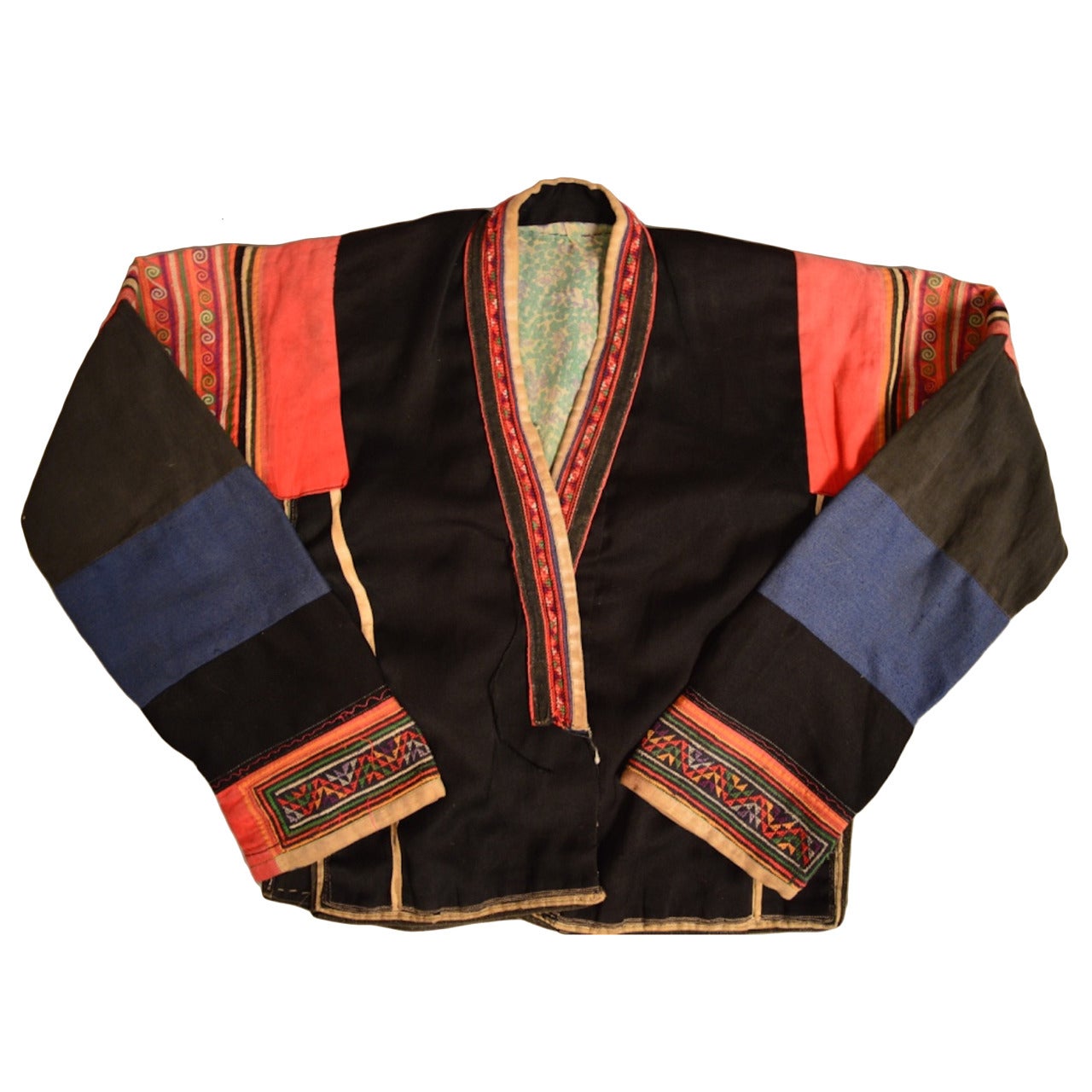 An early 20th century, Chinese minority (Miao) children's jacket and skirt in good condition. Beautiful skilled hand embroidered panels in cotton in multiple colors embellish the jacket.
The skirt has a pattern that is resist dyed with indigo then