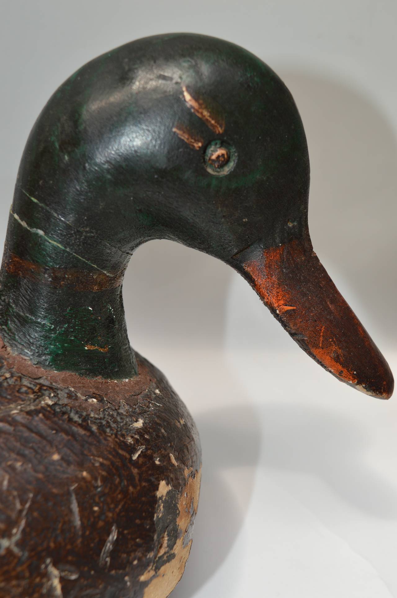 A very decorative Folk Art duck decoy carved from cork and painted in a wonderfully primative manner.