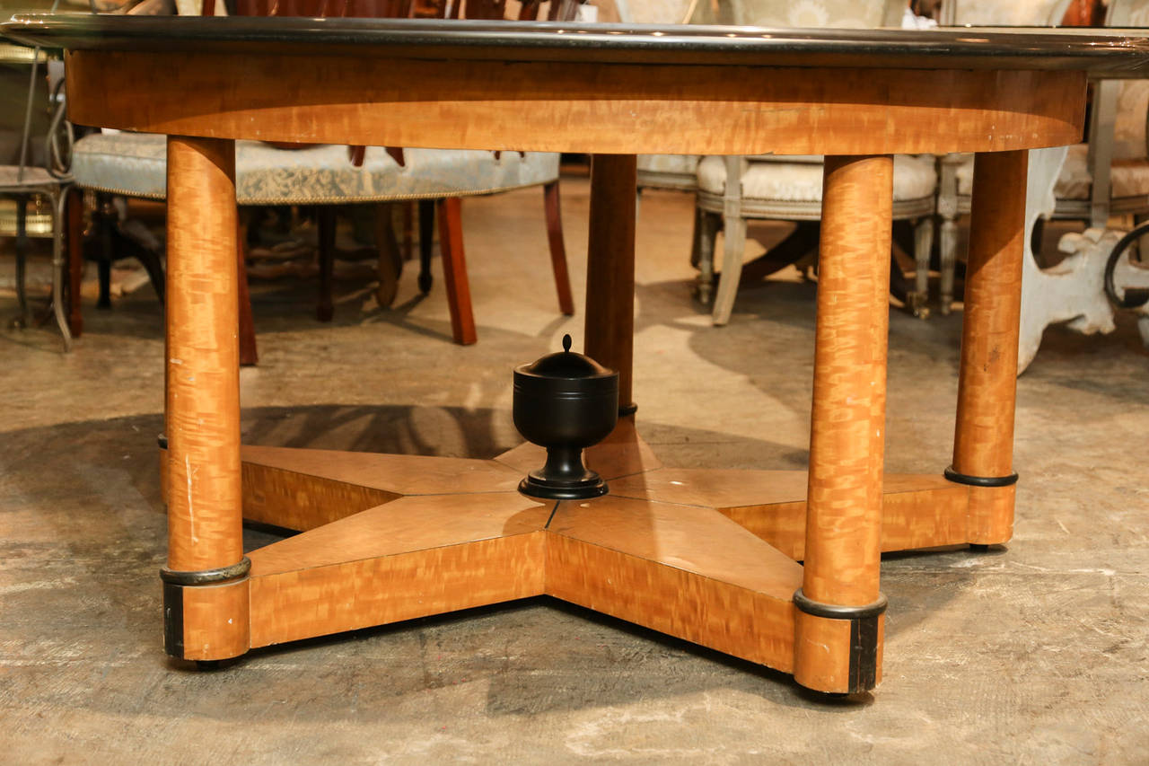 Handmade Biedermeier-style entry table with starburst shaped base made of birchwood and ebony details including center carved urn.

Top was hand-cut black granite, various marbles, and quartz.
   Took three months..