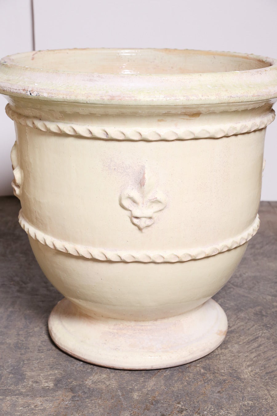 Two large Garden Urns in a light ochre color