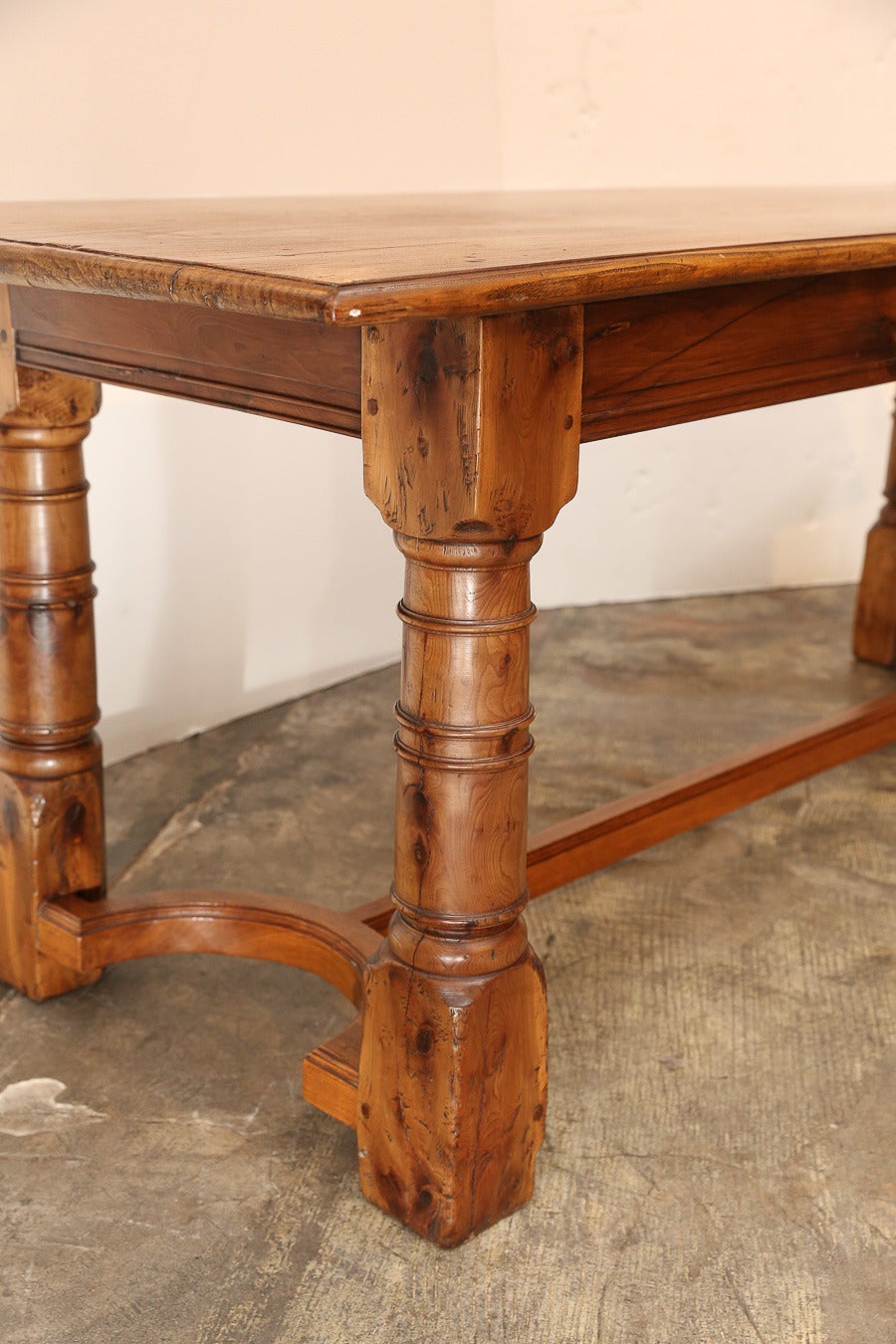 Antique Chestnut Console Table with heavy turned legs joined by a stretcher.