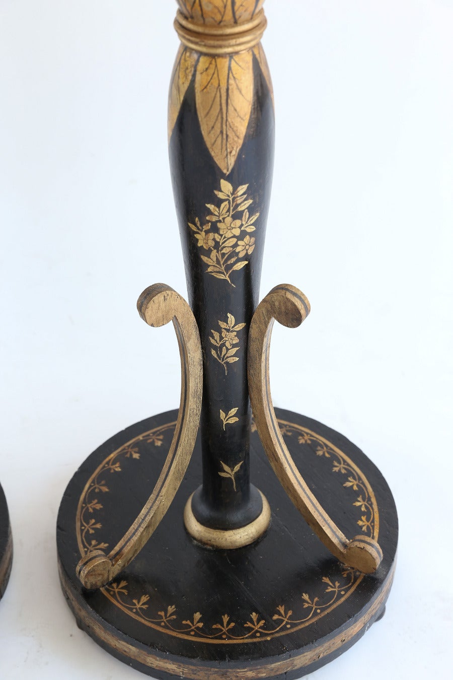 Pair of fine and rare early 19th century English Regency parcel-gilt and ebonized torchère.