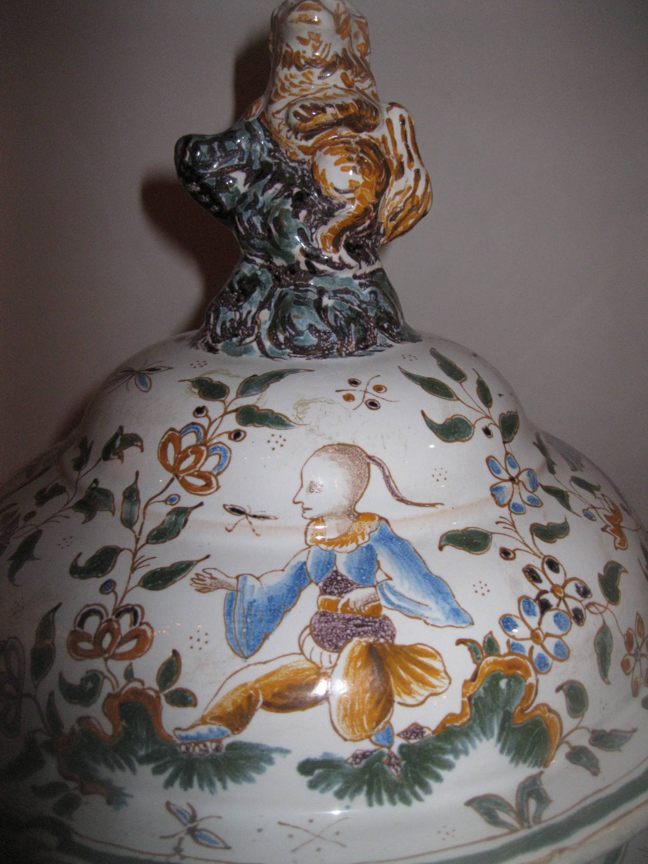 Polychromed Pair of Moustier French Faience Lidded Urns For Sale