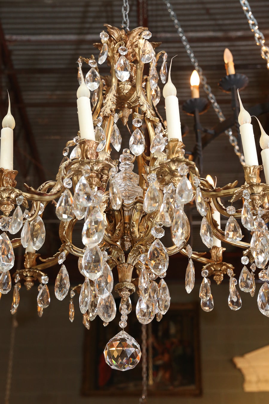French Bronze Doré and Crystal Twelve-Light Chandelier Attributed to Maison Jansen