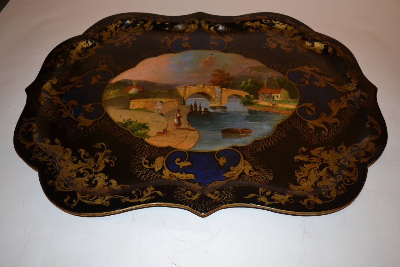 Charming painted  scene on scalloped-edge tray is 