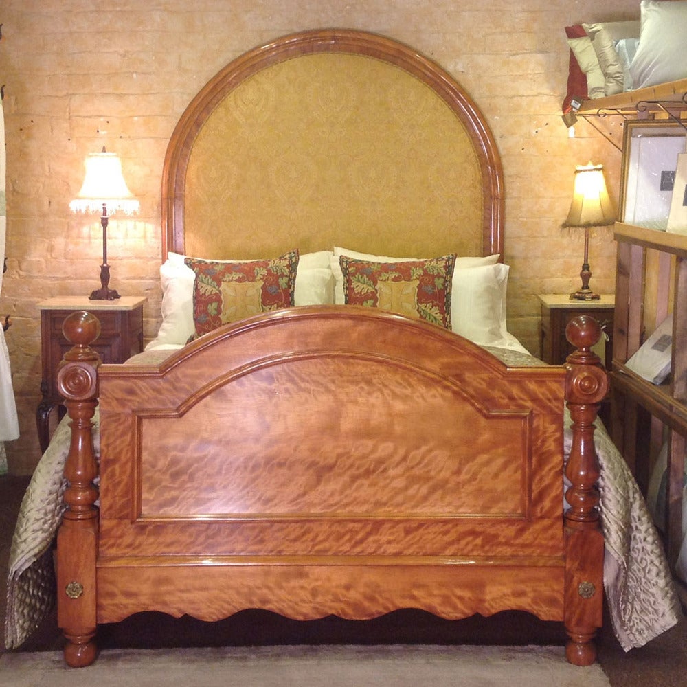 A superb light maplewood Scottish half tester bedstead with moire effect panels and turned posts. The tall back panel has an upholstered back board and the inside of the foot has also been upholstered and covered in a cream damask.

The bed