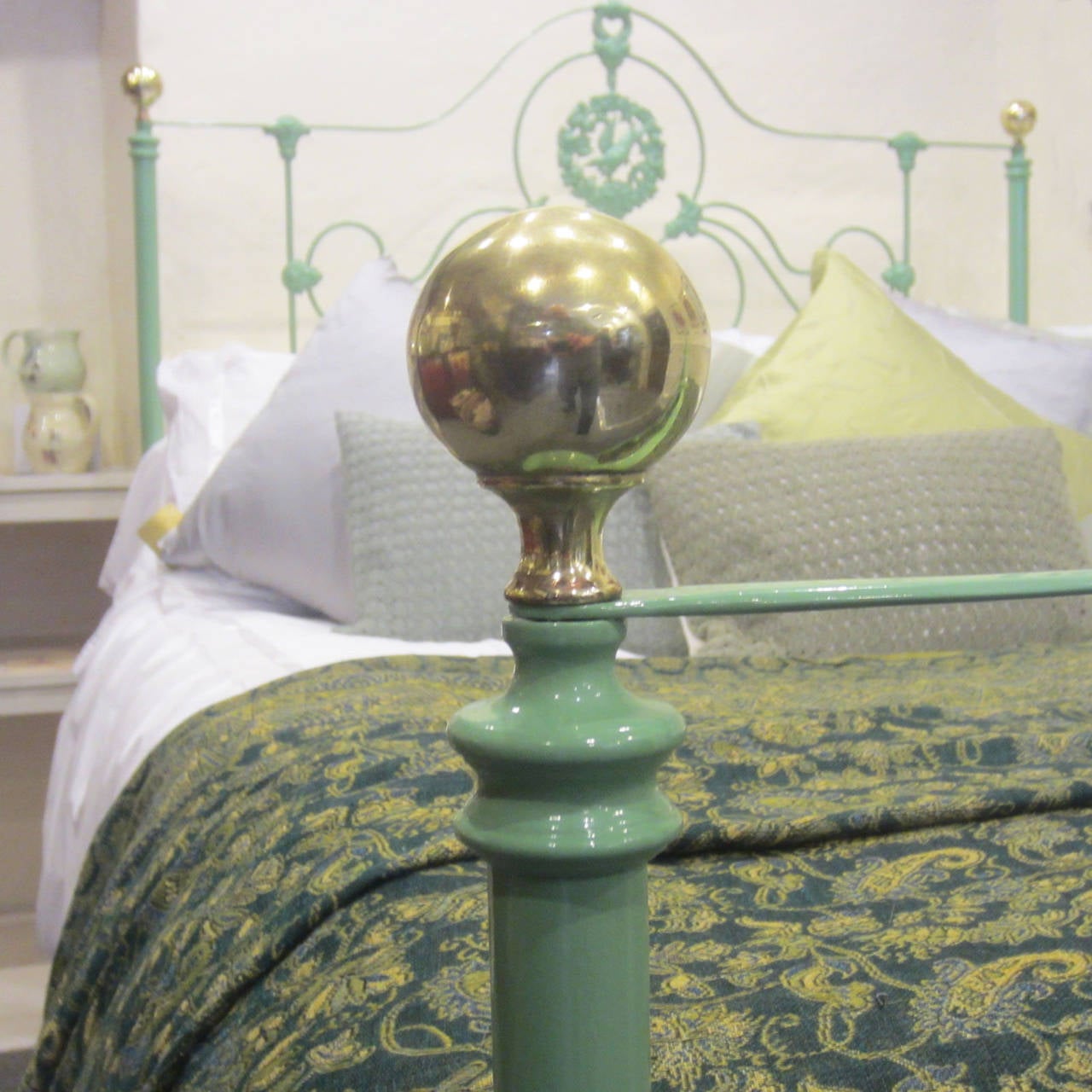 brass bed with porcelain knobs