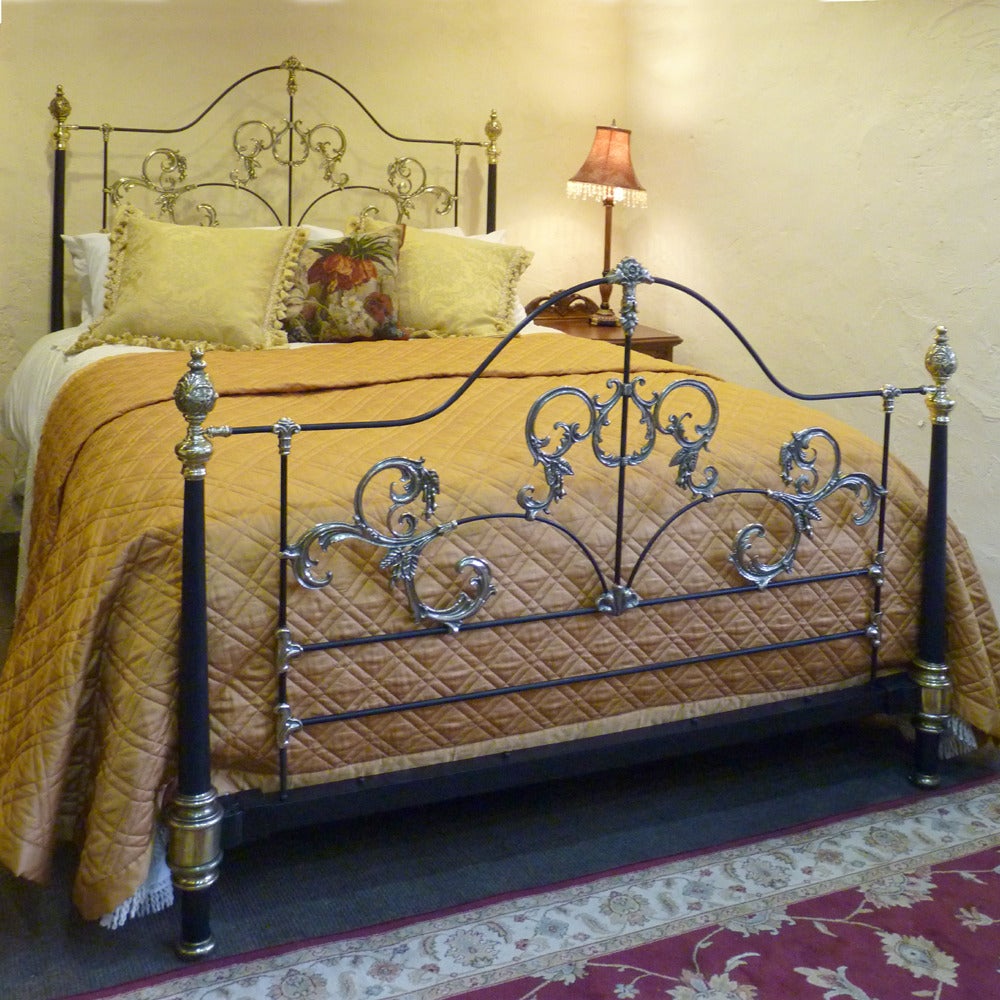 A fabulous cast brass and iron bedstead with tapered posts and decorative panels adapted from an original bed, circa 1880.

This bed accepts a British King Size or American Queen Size base and mattress set.

The dimensions of this bed