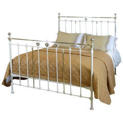 Elegant Brass and Iron Bed in Cream