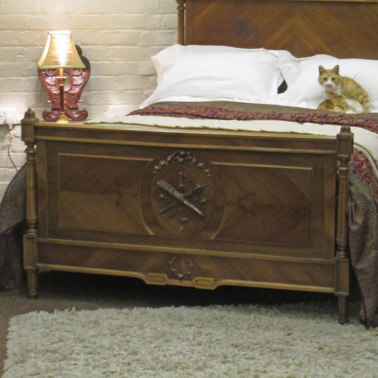 Lovely walnut double bed with rich patina and carving on the panels. Circa 1910.

This  bed  accepts a standard double (4ft 6in x 6ft 3in) base and mattress set.

The price is for the bedstead alone, the base, mattress and bedding are extra and