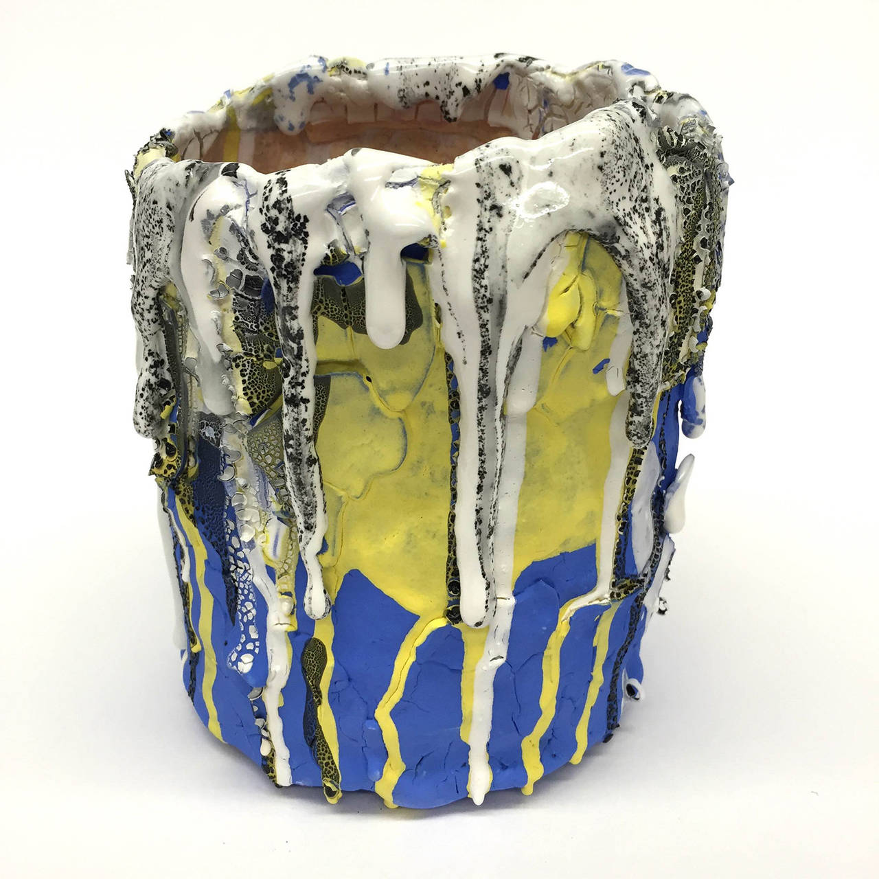 Contemporary ceramic vessel by LA based mixed-media sculptor Brian Rochefort for Kelly Behun Studio. Highly textured and worked surface resulting from multiple firings. Multicolored glazes including cobalt, yellow, black and white. Watertight, may