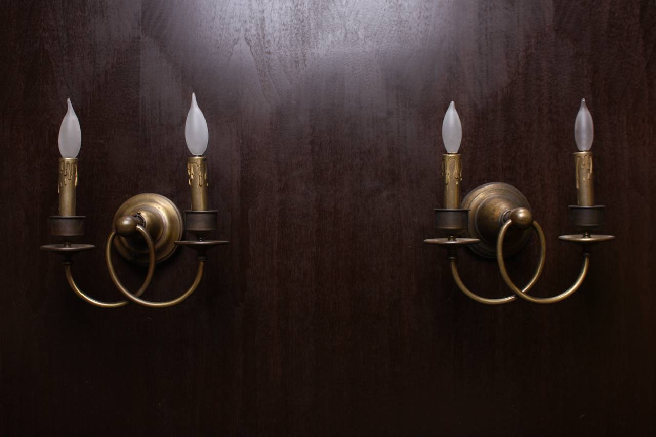 Antiqued Brass Double-Arm Sconces In Good Condition For Sale In Santa Monica, CA