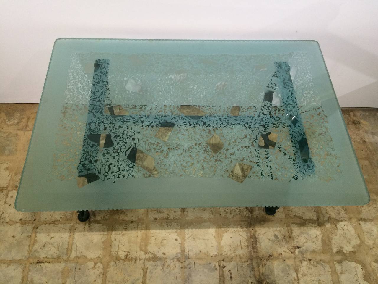 Important sculpted and patinated steel, and sculpted and sandblasted glass desk by Marco de Gueltzl (1958-1992).