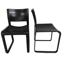 Pair of Matteo Grassi Distressed Leather Chairs