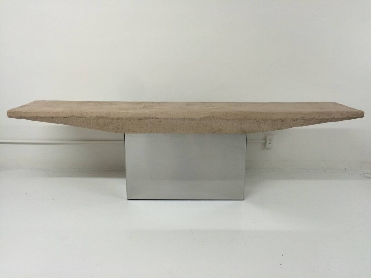 Mirror polished stainless steel and stone composition console table.