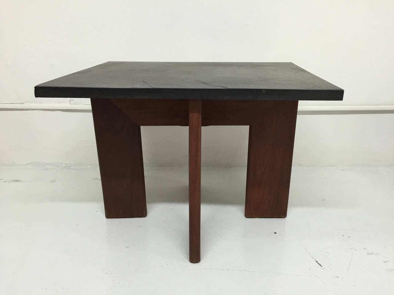 Pair of side tables in walnut with slate tops by Adrian Pearsall for Craft Associates.
