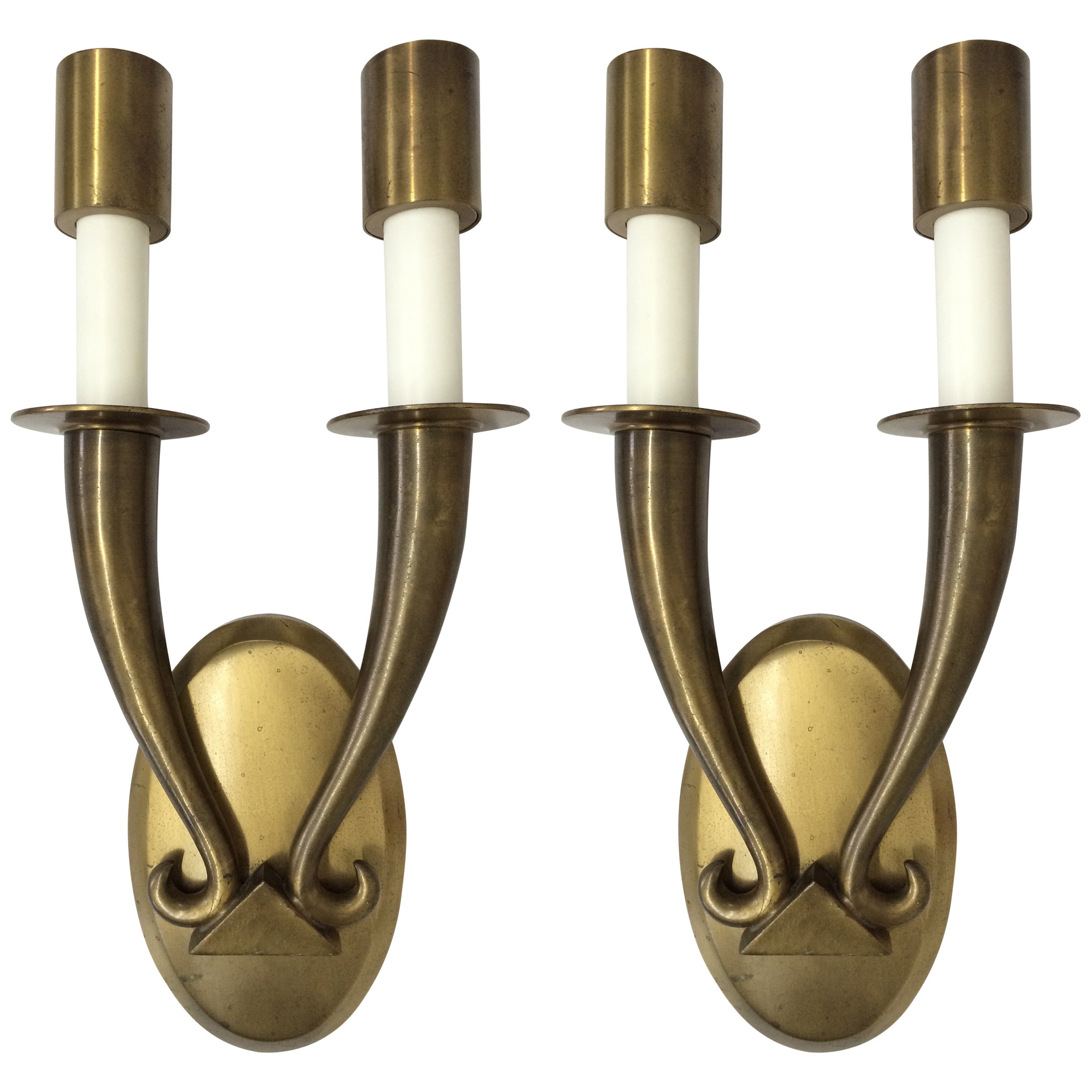 Pair of Unlacquered Brass Art Deco Wall Sconces in the style of Ruhlmann