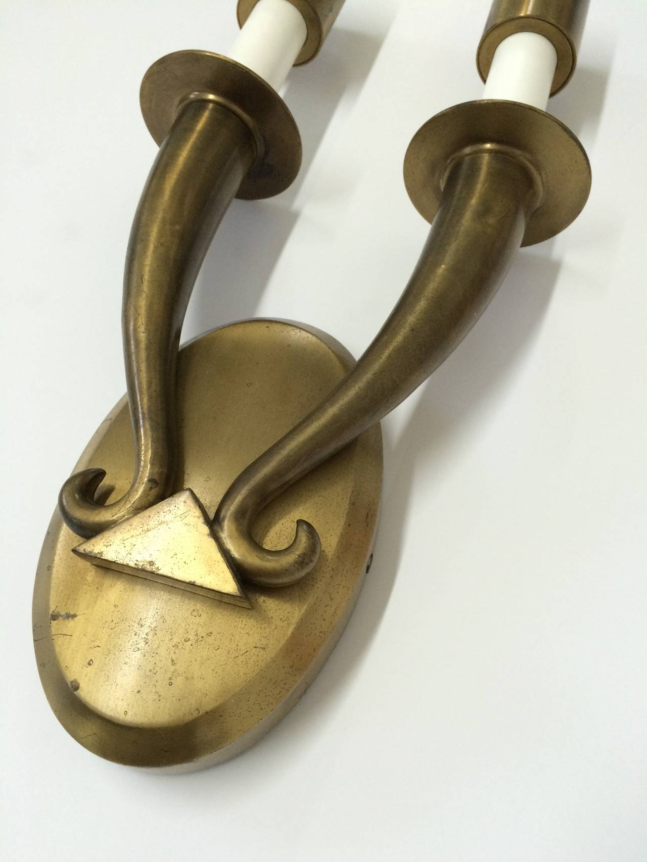 Pair of Unlacquered Brass Art Deco Wall Sconces in the style of Ruhlmann In Good Condition In Miami, FL