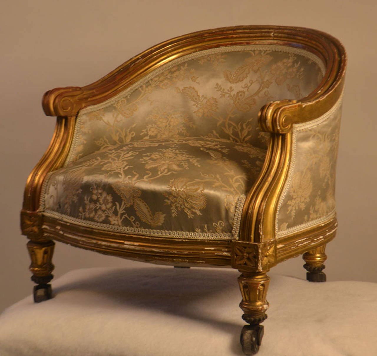 Small giltwood Louis XVI style footstool.