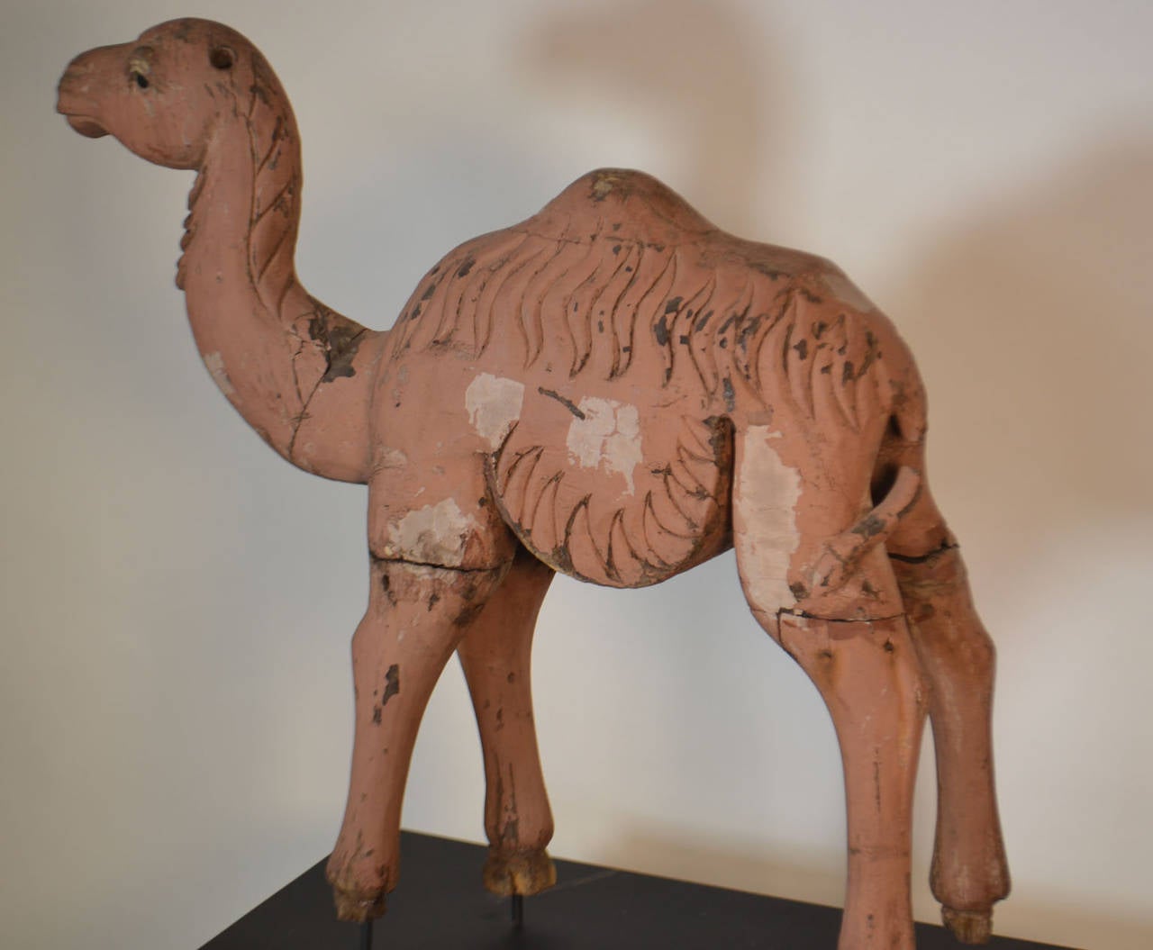 Carved wooden and painted camel, circa 1890.