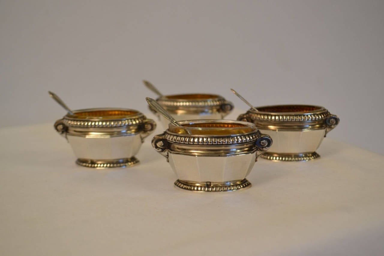 Late 19th-early 20th century set of sterling silver salt cellars and spoons, French 950 Silver with Minerva mark. Cellars have crystal liners.