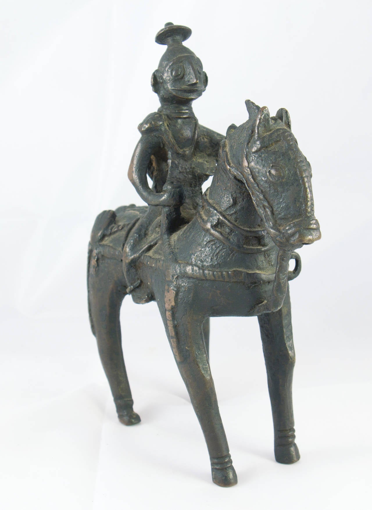 Circa 18th/19th Century. Indian Jungli cast bronze warrior on horseback. A very fine example of the genre.