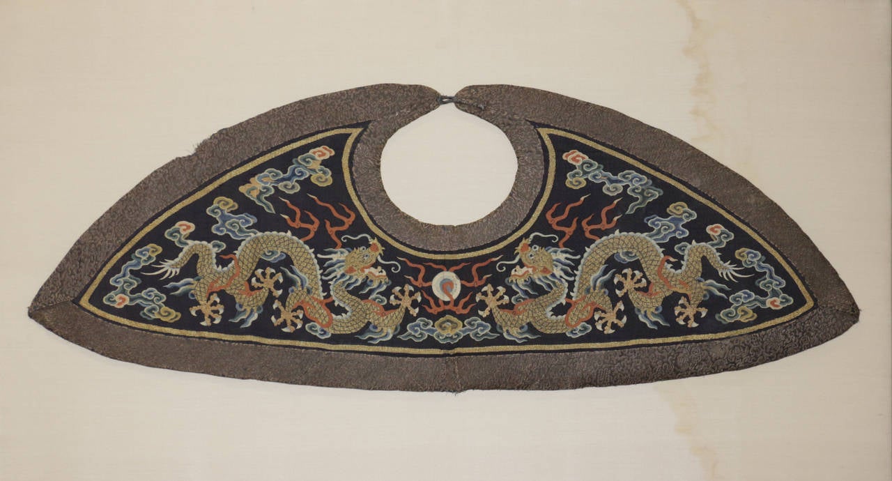 Chinese silk Kesi (kossu, slit weave tapestry) court collar, Ching Dynasty circa late 18th Century. Mounted on stretcher.