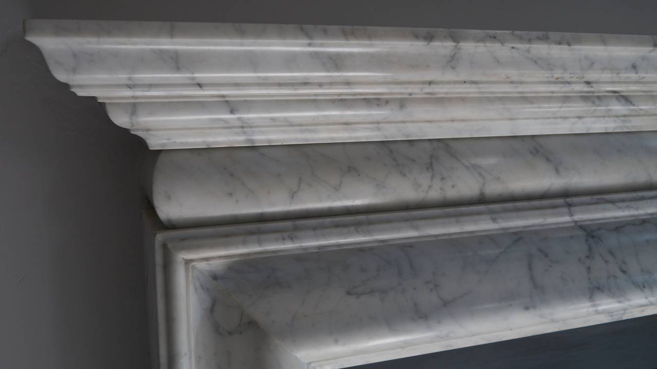 Victorian Carrara marble bolection.