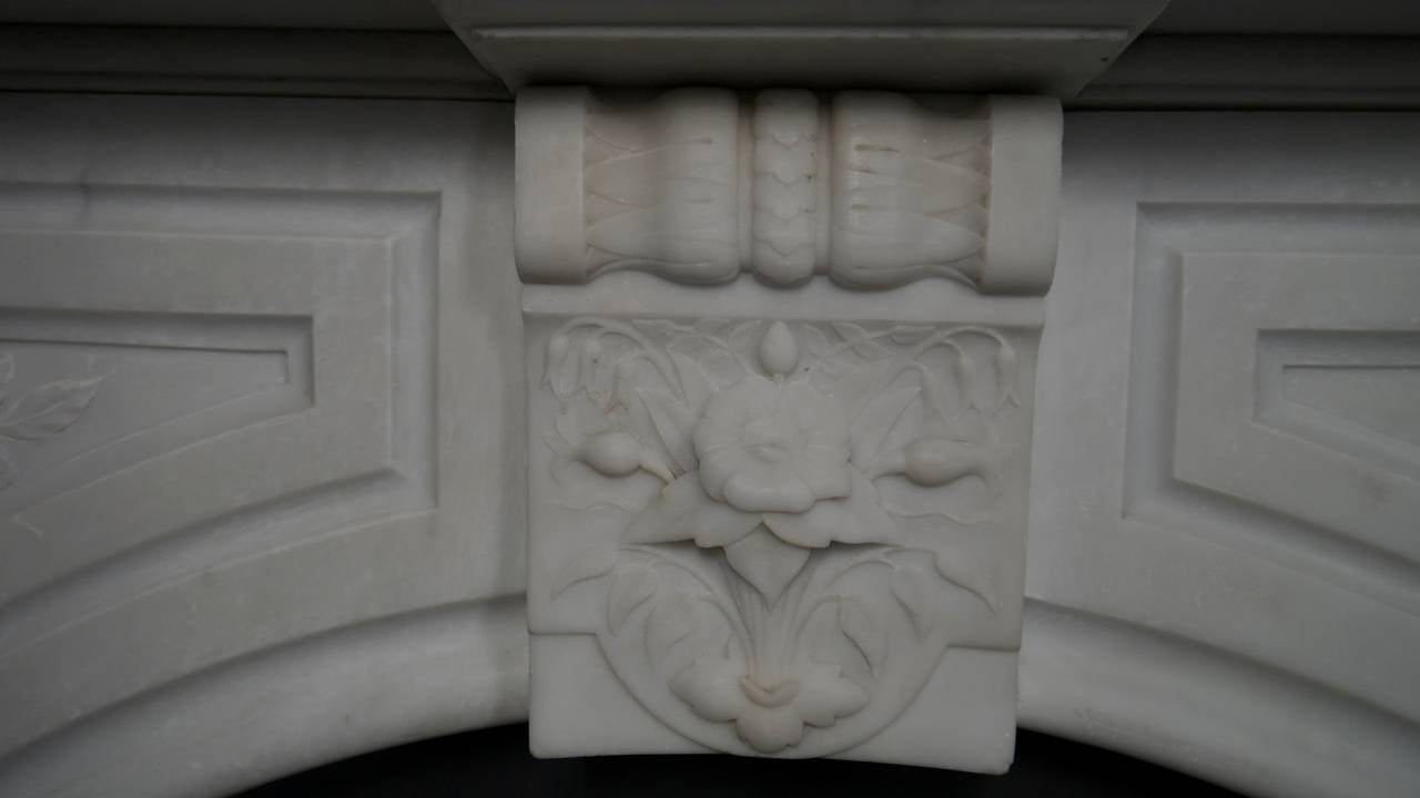 Original Victorian carved statuary white arched marble surround. Opening 41