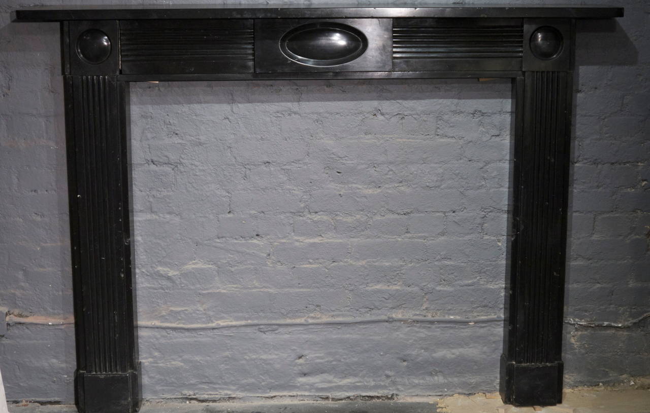 Original Black Fossil Marble Bull's Eye Fireplace Surround
