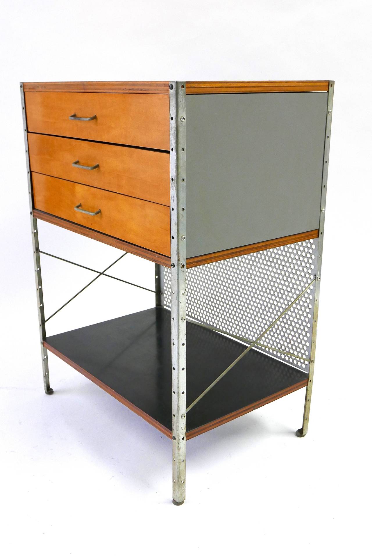 The Eames approach to designing case goods presented a system of interchangeable parts that could be easily adapted to a variety of office uses or home storage needs. This early example is from the first production in 1950.