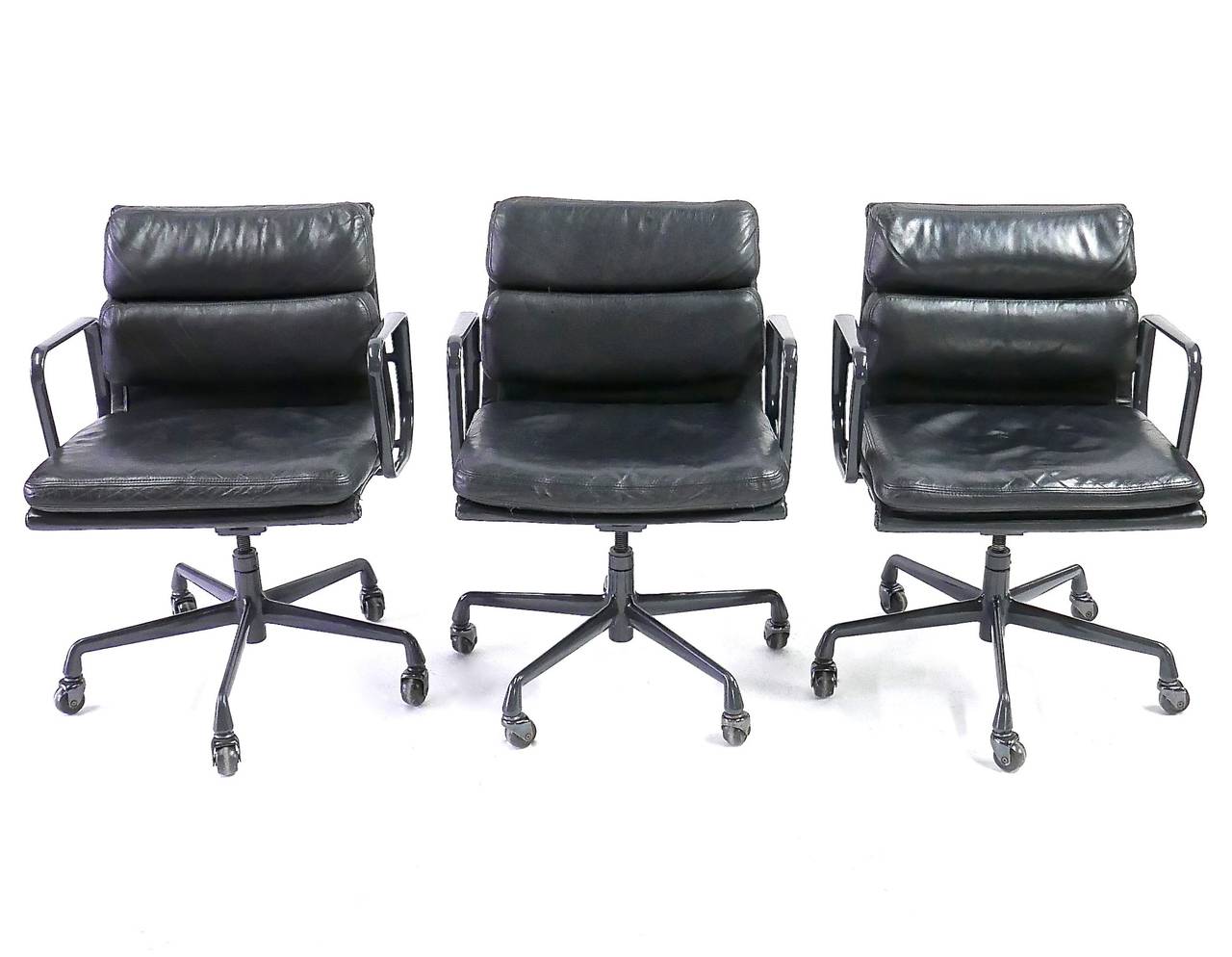 Enameled Set of Eight Black Leather Eames Soft Pad Chairs by Herman Miller