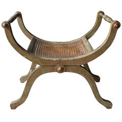 Tabouret curule français du 19ème siècle en bois doré et peint et canné
