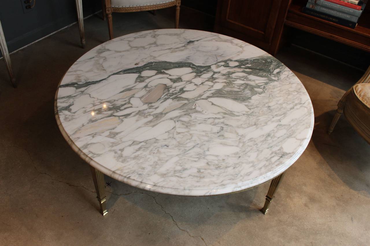 round marble and brass coffee table